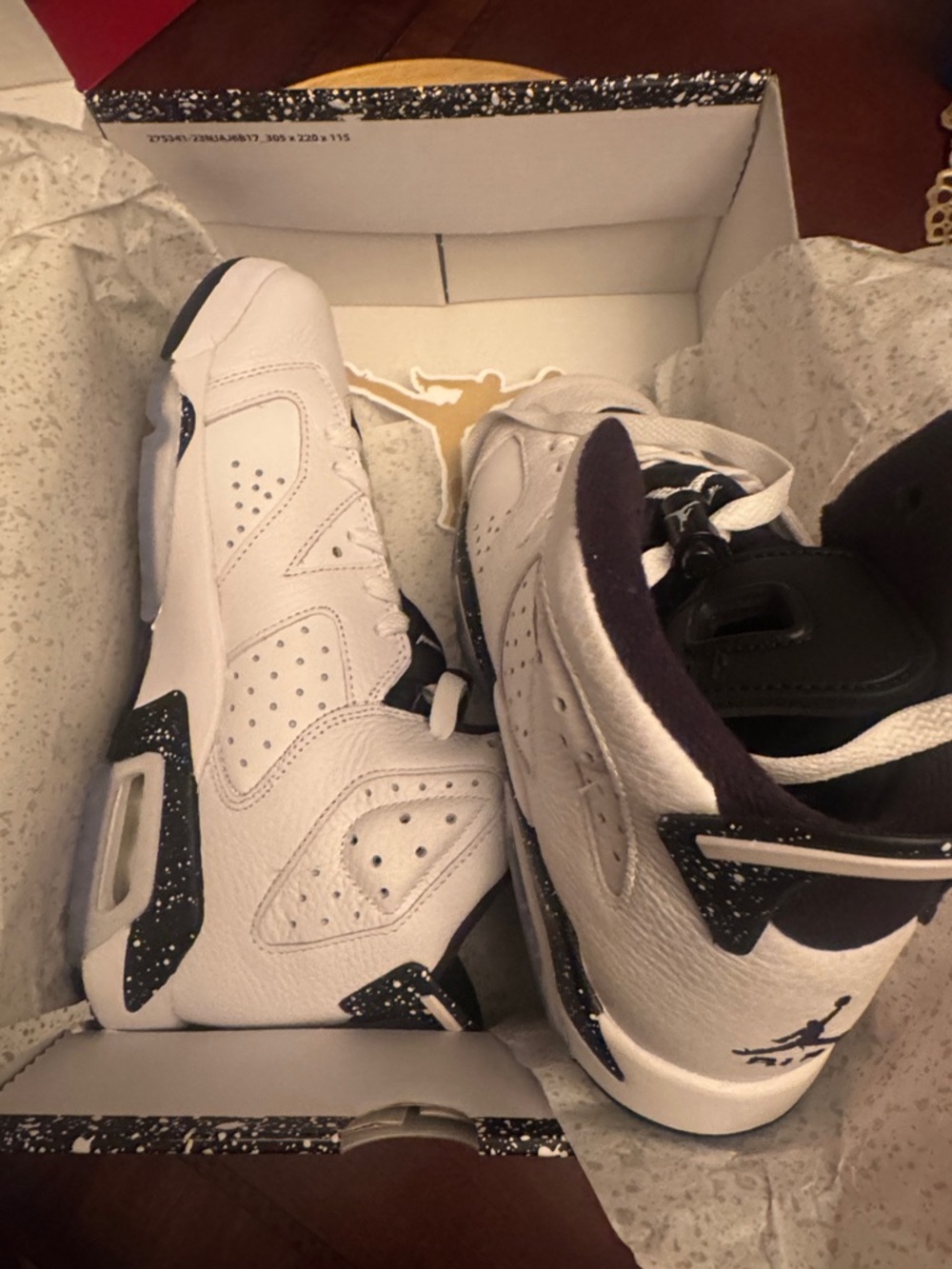 New White and Black Retro Jordan Sneaker with Speckled Accents size 6y